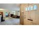 Open concept view of the living room, dining room, and front door at 1606 Orangewood Ave, Orlando, FL 32806