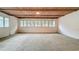 Bright living room with lots of windows and a wooden ceiling at 1606 Orangewood Ave, Orlando, FL 32806