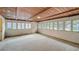 Spacious living room featuring a wood ceiling at 1606 Orangewood Ave, Orlando, FL 32806