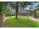 Spacious backyard with a screened-in pool area at 1689 Wingspan Way, Winter Springs, FL 32708
