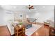 Inviting bonus room with hardwood floors, comfortable seating, and overhead lighting at 1689 Wingspan Way, Winter Springs, FL 32708