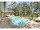 A screened pool area features brick pavers, ample seating, and a refreshing pool at 1689 Wingspan Way, Winter Springs, FL 32708