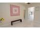 Inviting foyer with tile flooring and a view of the kitchen provides ample space for welcoming guests at 1764 Carillon Park Dr, Oviedo, FL 32765