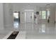 Bright foyer features tile flooring and views into other rooms at 1764 Carillon Park Dr, Oviedo, FL 32765