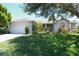 Charming one story home with mature landscaping and a two car garage at 1764 Carillon Park Dr, Oviedo, FL 32765