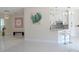 Open living space with breakfast bar and bright white cabinets at 1764 Carillon Park Dr, Oviedo, FL 32765