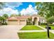 Charming single-Gathering home with a well-manicured lawn and inviting curb appeal at 2000 Bloomsbury Run, Lake Mary, FL 32746