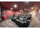 Lavish home theater equipped with comfortable seating, a popcorn machine, and an impressive screen at 2000 Bloomsbury Run, Lake Mary, FL 32746