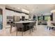 Open concept kitchen with a center island, stainless steel appliances, and stylish pendant lighting at 2000 Bloomsbury Run, Lake Mary, FL 32746