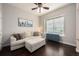Cozy living room featuring a comfortable sofa, a large window, and stylish decor at 2000 Bloomsbury Run, Lake Mary, FL 32746