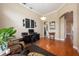 Bright office space featuring hardwood floors, neutral walls, and an open layout to adjacent rooms at 20603 Paddock St, Orlando, FL 32833