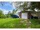 Spacious garage for storing your boat, with adjacent carport for additional parking at 20603 Paddock St, Orlando, FL 32833
