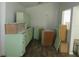 View of the kitchen space showcasing plenty of cabinet storage and bright natural light at 2112 Lee St, Orlando, FL 32805