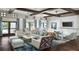Inviting lounge area featuring comfortable seating, elegant decor, and ample natural light at 2114 Fleming Mist Pl, Kissimmee, FL 34747