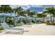 Luxurious poolside cabanas providing shaded seating and relaxation by the pool at 2114 Fleming Mist Pl, Kissimmee, FL 34747