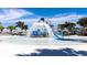 Fun splash pad area for with water features, slide, and palm trees, ideal for Gathering fun at 2114 Fleming Mist Pl, Kissimmee, FL 34747