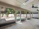Screened-in patio view of the backyard pool and brick surround at 2151 Conifer Ave, Winter Park, FL 32792