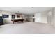 Large bonus room with pool table, neutral carpet, and double door closet at 2275 Pearl Cider St, Orlando, FL 32824
