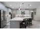 Gorgeous kitchen featuring a large island, stainless steel appliances, and ample counter space at 2275 Pearl Cider St, Orlando, FL 32824