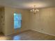 Inviting dining room with tiled flooring and large windows, providing lots of light at 228 Everest Pt # 108, Casselberry, FL 32707