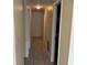 Hallway with tile flooring leading to several rooms, offering easy access throughout the home at 228 Everest Pt # 108, Casselberry, FL 32707