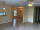 Spacious living room with tiled floors, ceiling fan, and open floor plan leading to the dining area at 228 Everest Pt # 108, Casselberry, FL 32707