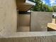 Enclosed back patio with concrete pavers and stucco walls, offering a private outdoor space at 228 Everest Pt # 108, Casselberry, FL 32707