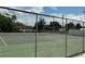 Outdoor tennis court featuring well-maintained surface and secure fencing for recreational enjoyment and property enhancement at 228 Everest Pt # 108, Casselberry, FL 32707