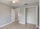 Neutral bedroom with hardwood floors and closet at 2360 Brewerton Ln, Orlando, FL 32824