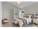 Staged bedroom with hardwood floors and closet at 2360 Brewerton Ln, Orlando, FL 32824