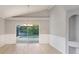 Bright dining room with large window that overlooks the private pool and lanai at 2360 Brewerton Ln, Orlando, FL 32824