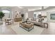 Inviting living area with views to the kitchen, showcasing stylish furniture and decor at 2360 Brewerton Ln, Orlando, FL 32824