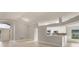Bright and airy living area featuring hardwood floors, an open layout, and stylish finishes at 2360 Brewerton Ln, Orlando, FL 32824