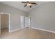 This main bedroom features a walk-in closet and a pair of bright, adjacent rooms at 2360 Brewerton Ln, Orlando, FL 32824