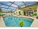 Sun-drenched pool area with comfortable seating, overlooking the crystal clear waters of the inground pool at 2360 Brewerton Ln, Orlando, FL 32824