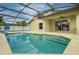 Captivating screened-in pool area with ample seating and clear view through sliding glass doors to the interior at 2360 Brewerton Ln, Orlando, FL 32824