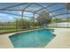 The pool overlooks the backyard and pond at 2360 Brewerton Ln, Orlando, FL 32824