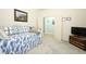 Cozy bedroom area with comfortable-looking day bed and carpet floors at 2362 Prairie Dunes, Clermont, FL 34711