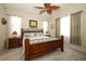Comfortable bedroom featuring a ceiling fan and two windows to let the natural light in at 2362 Prairie Dunes, Clermont, FL 34711