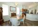 Dining area featuring a chandelier and a view of the kitchen at 2362 Prairie Dunes, Clermont, FL 34711