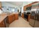 Well-equipped kitchen featuring stainless steel appliances and sleek countertops at 2362 Prairie Dunes, Clermont, FL 34711