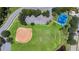 Overhead shot of the baseball field, playground and parking lot at 2388 Baronsmede Ct, Winter Garden, FL 34787