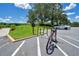 Convenient bike rack for cyclists with car parking nearby, encouraging an active and sustainable lifestyle at 2388 Baronsmede Ct, Winter Garden, FL 34787