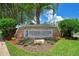 Stone Fitness Center sign surrounded by lush landscaping, setting the tone for health and well-being at Stoneybrook at 2388 Baronsmede Ct, Winter Garden, FL 34787