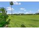 This picturesque golf course offers a serene backdrop to this home at 2388 Baronsmede Ct, Winter Garden, FL 34787