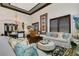 Bright and spacious living area showcasing hardwood floors and plantation shutters at 2388 Baronsmede Ct, Winter Garden, FL 34787