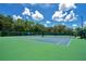 Active lifestyle awaits with well-maintained tennis courts, perfect for friendly matches and skill-building sessions at 2388 Baronsmede Ct, Winter Garden, FL 34787
