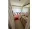 Bright bathroom featuring shower and tub combo, vanity and neutral design elements at 2515 La Jolla Trl, Kissimmee, FL 34747