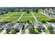 Aerial view of homes in a community; featuring green spaces between the neighborhoods at 264 Milestone Dr, Haines City, FL 33844