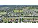 Panoramic aerial view of a neighborhood with well-maintained homes and green landscaping at 264 Milestone Dr, Haines City, FL 33844